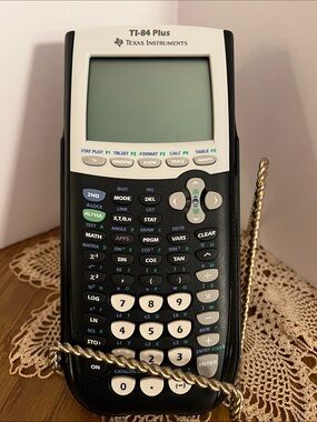 Texas Instruments TI-84 Plus Graphing Calculator in Black and White
